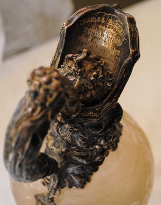 Engraving on top of glass claret jug 